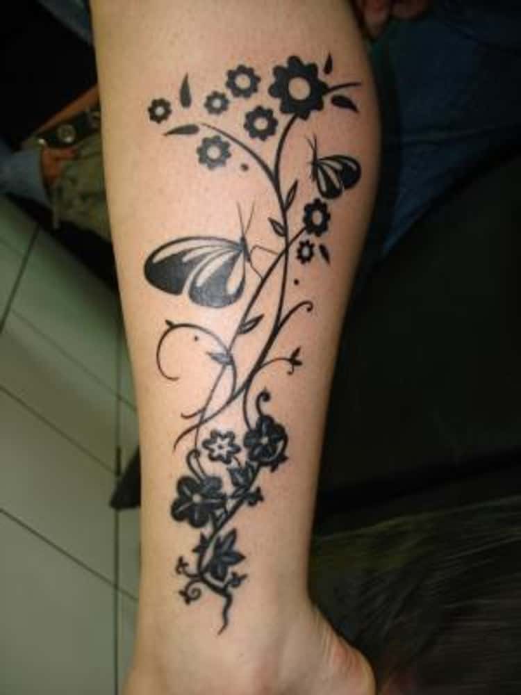Pure black Butterfly Leg Tattoos for Females
