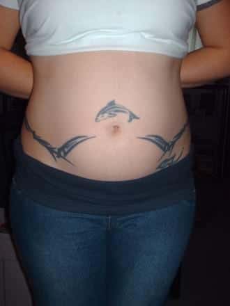 dolphin leaping towards the stars tattoo