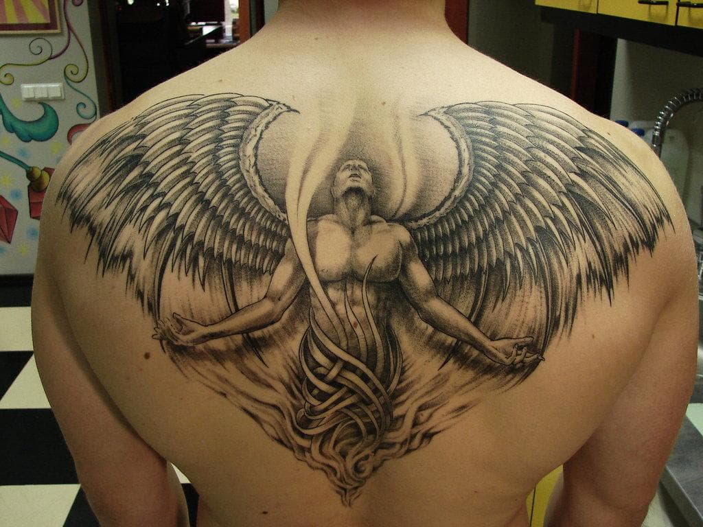 male back tattoo wings