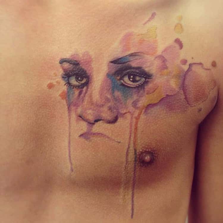 watercolor face tattoo