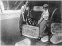 Girls deliver heavy blocks of ice after male workers were conscripted. on Random Powerful Photos of Women Who Changed History