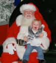 Santa's Terrifying Toothless Grin on Random Kids Who Are Terrified of Santa Claus