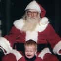 Serial Killer Santa About to Strangle This Kid on Random Kids Who Are Terrified of Santa Claus