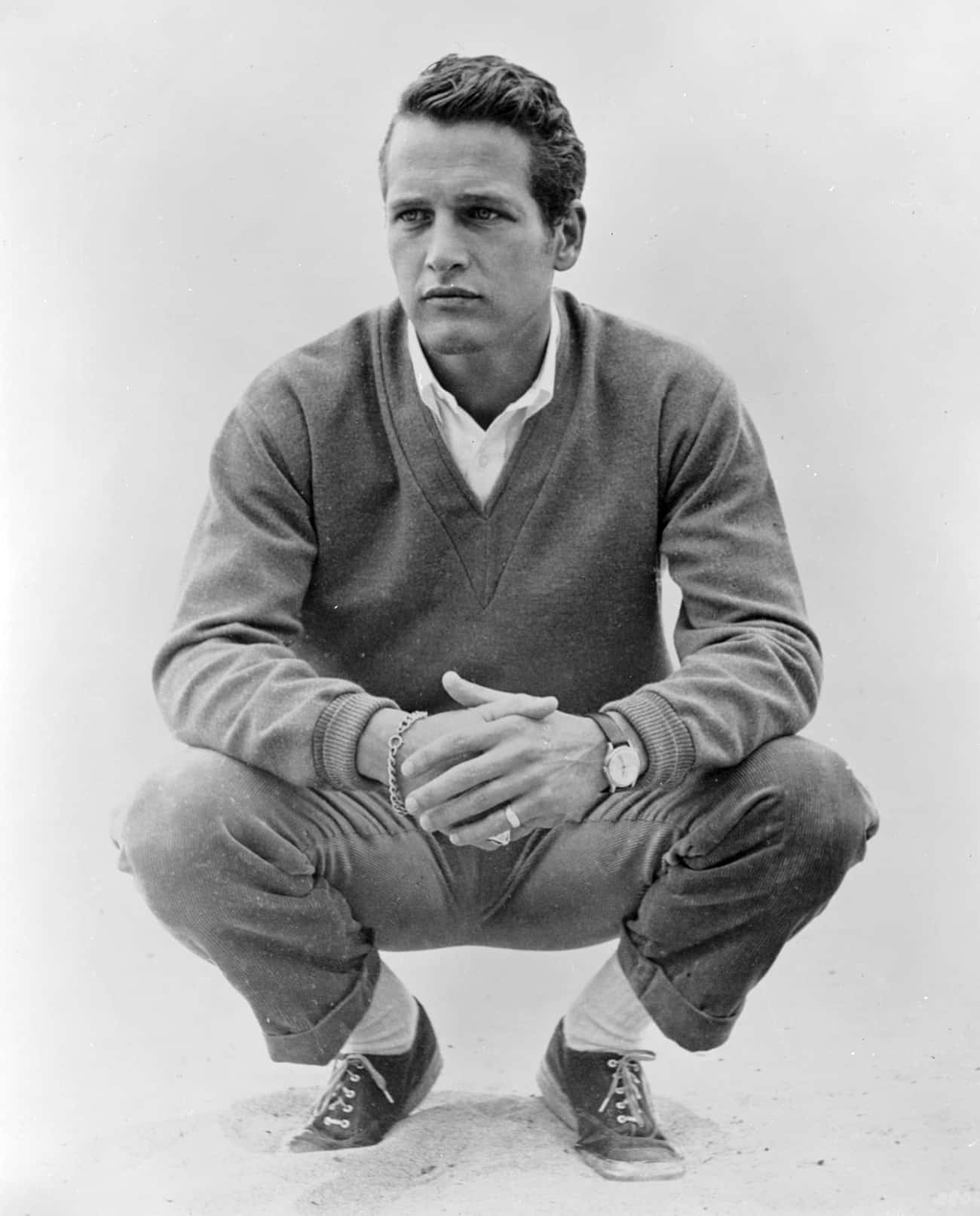 Young Paul Newman Crouching Down