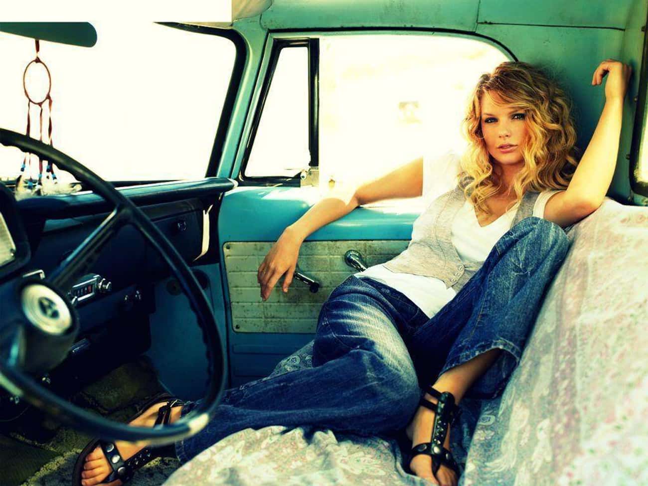 Young Taylor Swift Sitting in a Truck