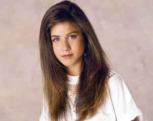 young-jennifer-aniston-in-white-blouse-photo-u1