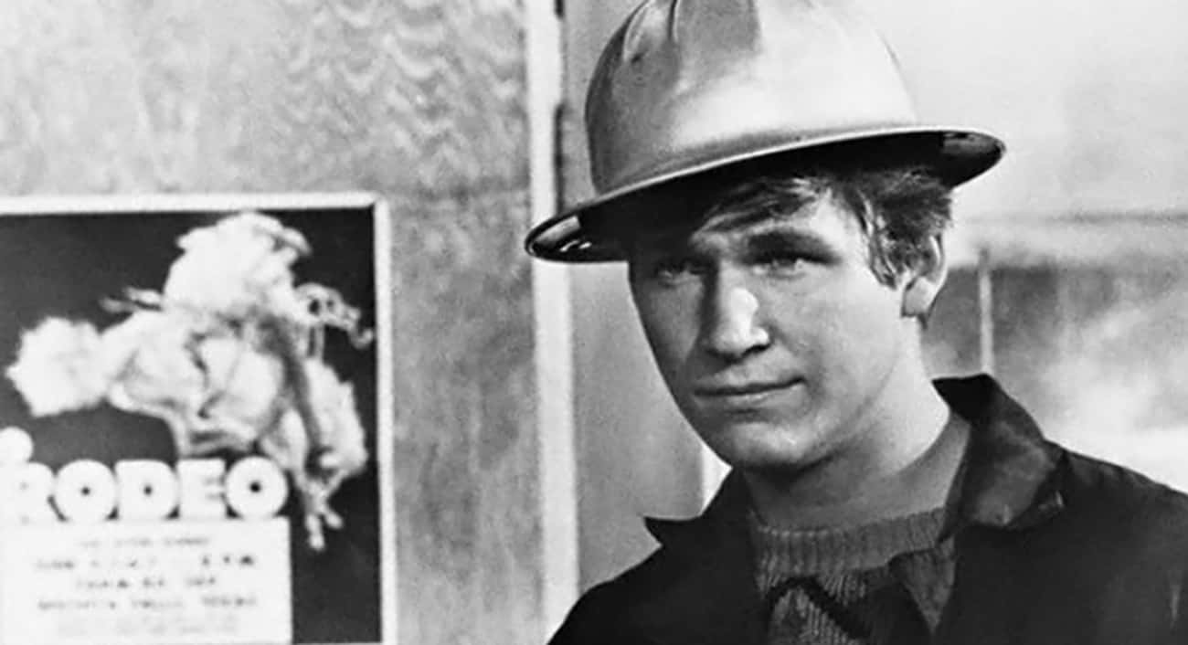 Young Jeff Bridges in a Gray Sweater Wearing Hard Hat
