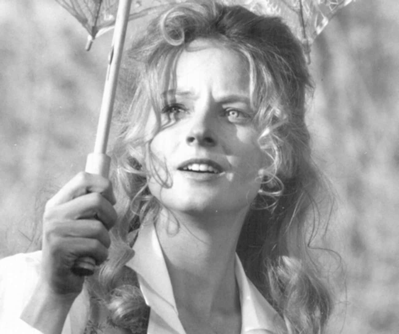 Young Jodie Foster in White Blouse Holding Umbrella