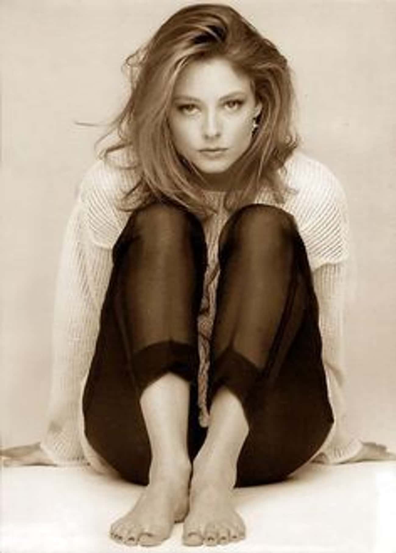 Young Jodie Foster in White Sweater and Black Pants
