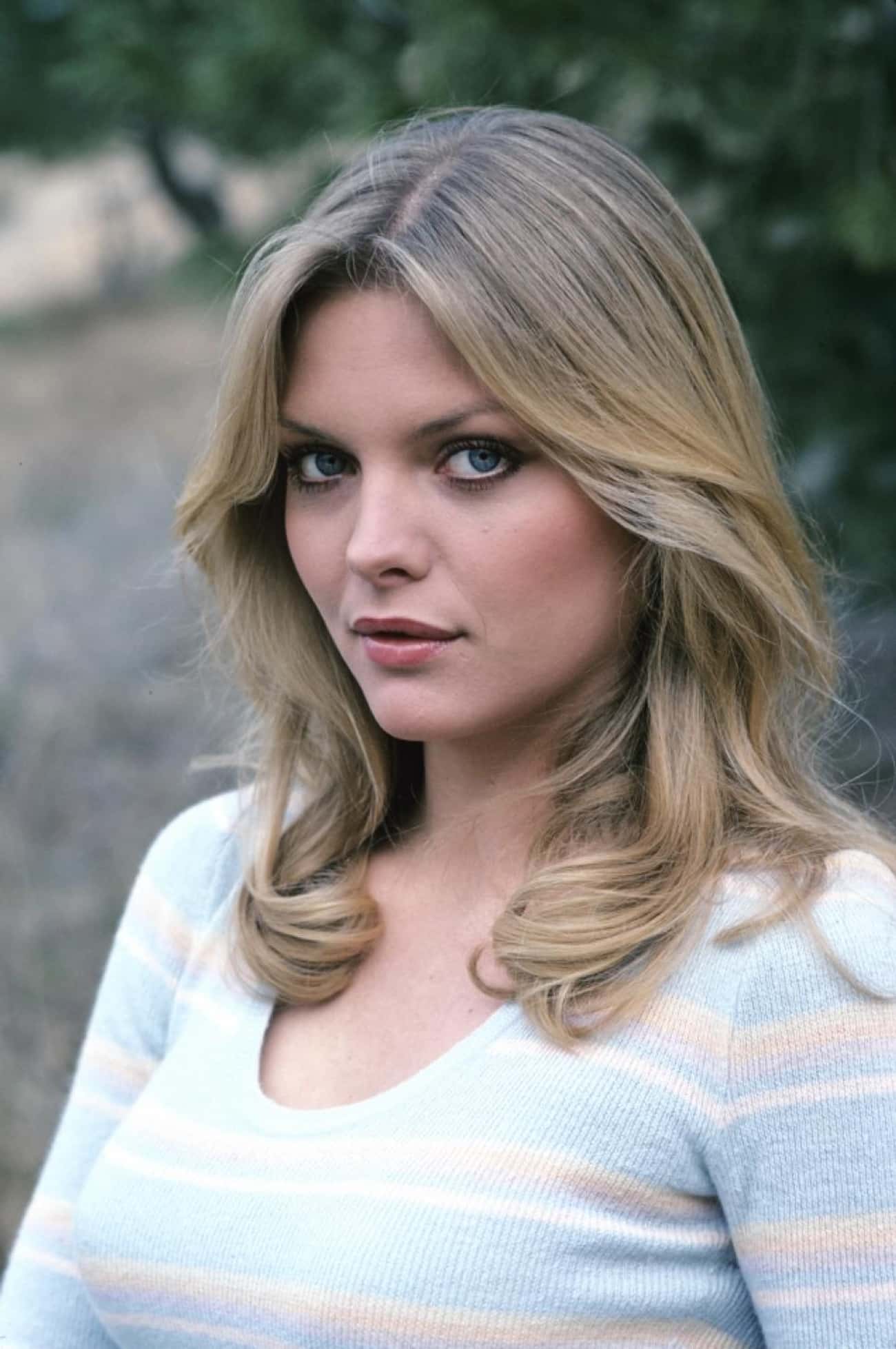 Young Michelle Pfeiffer in a Blue and White Striped Sweater