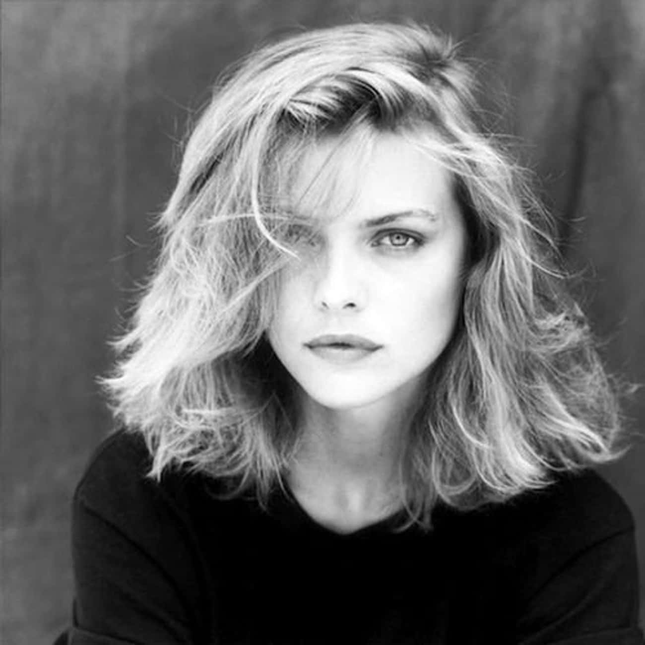 Young Michelle Pfeiffer in a Black Shirt Closeup Headshot
