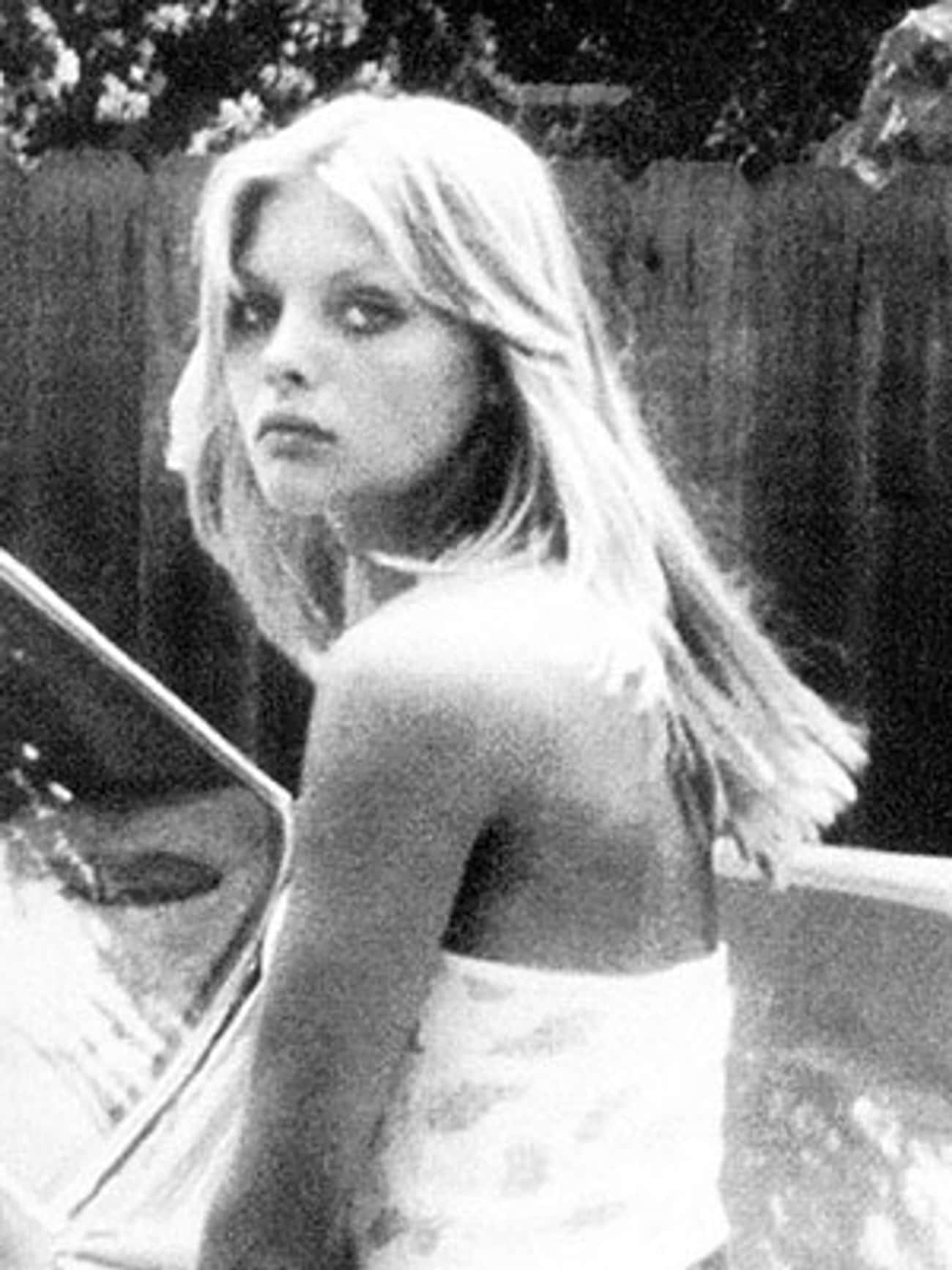 Young Michelle Pfeiffer in a White Tank