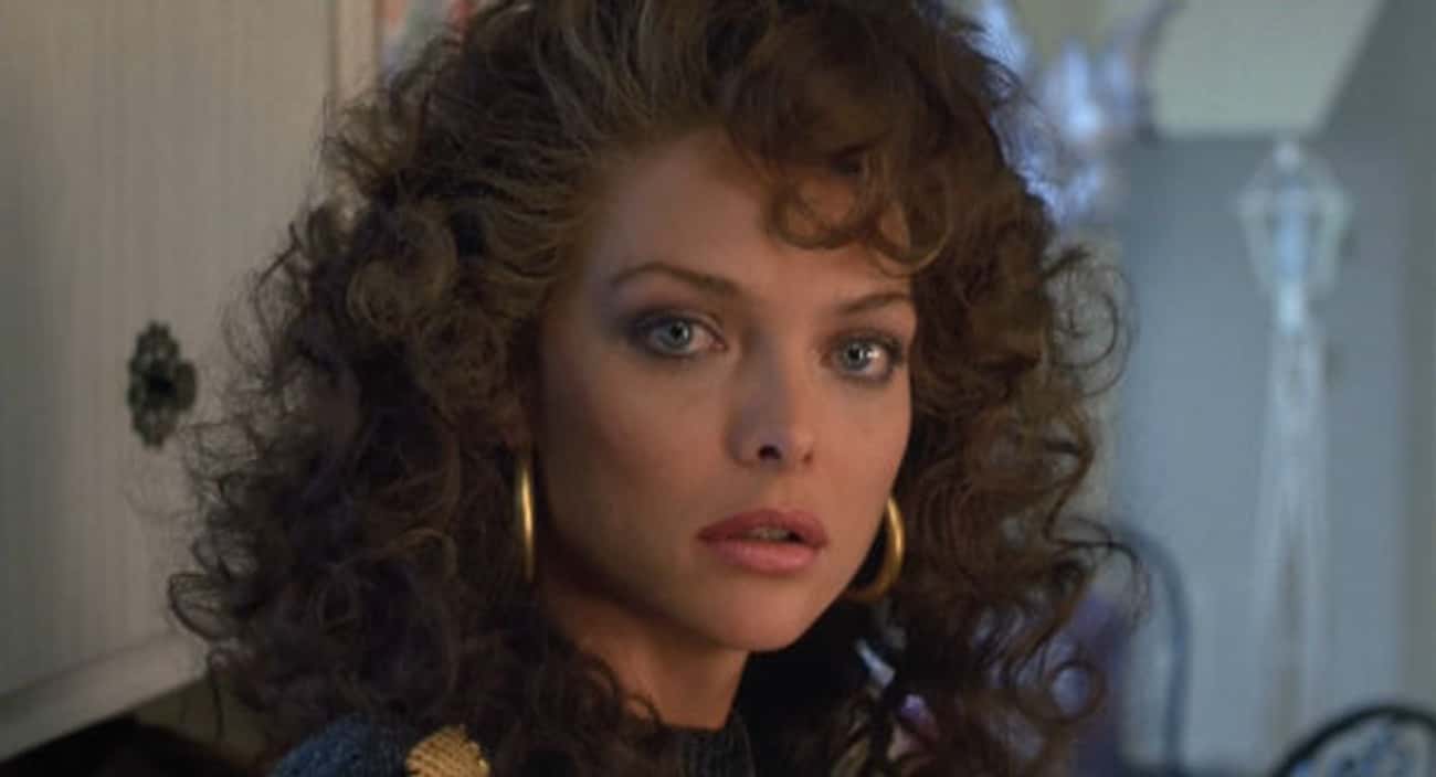 Young Michelle Pfeiffer with Dark Hair and Hoop Earrings