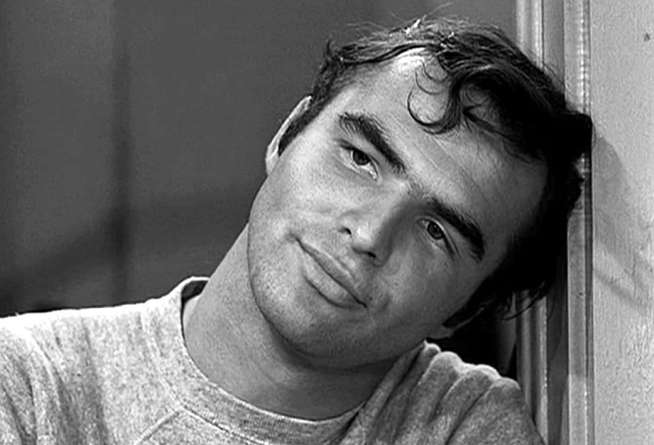 Young Burt Reynolds in a Gray Sweater