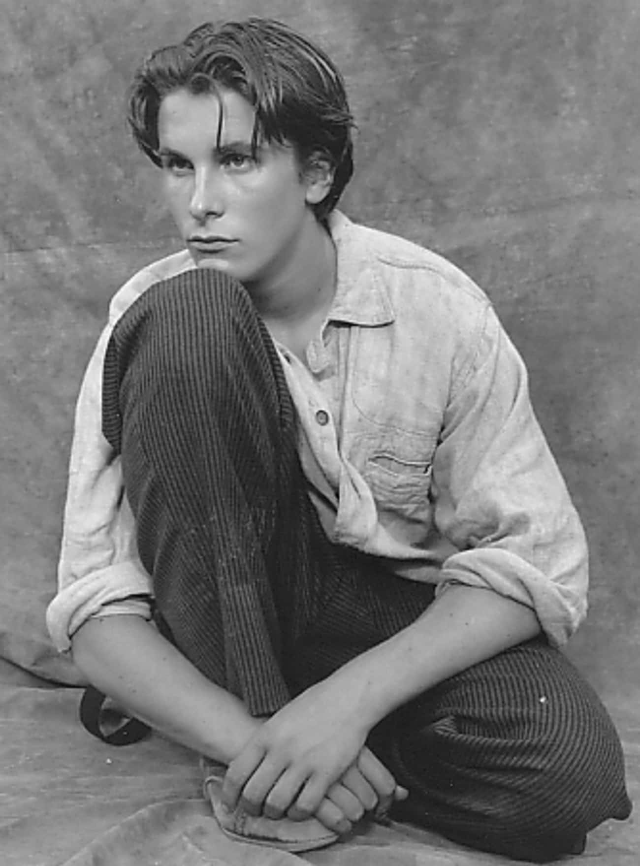 Young Christian Bale in Buttondown and Black and White Striped Pants