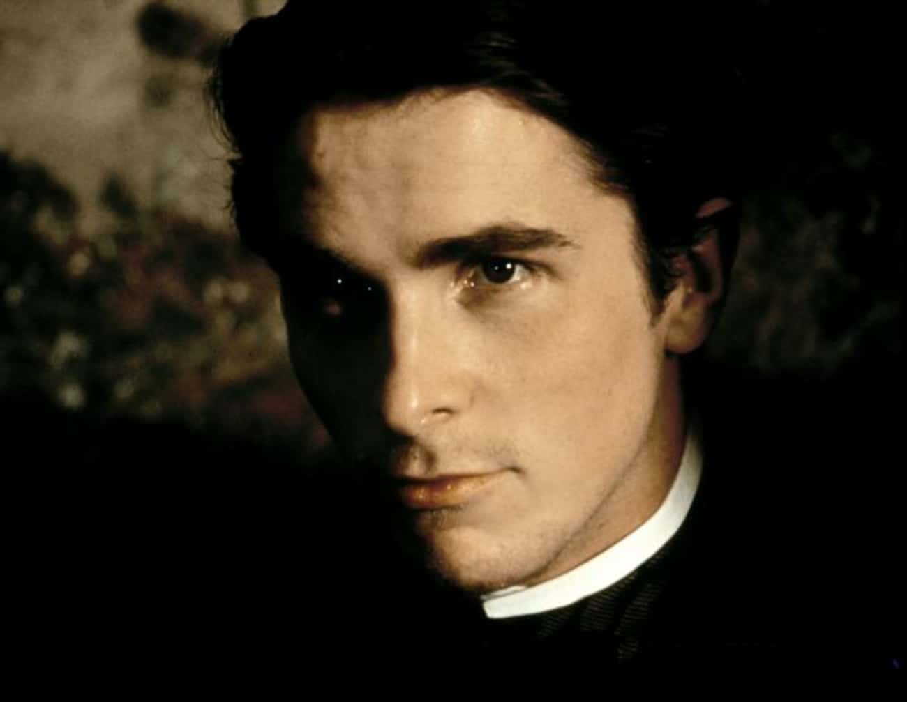 Young Christian Bale in Black Coat with White Collar Closeup