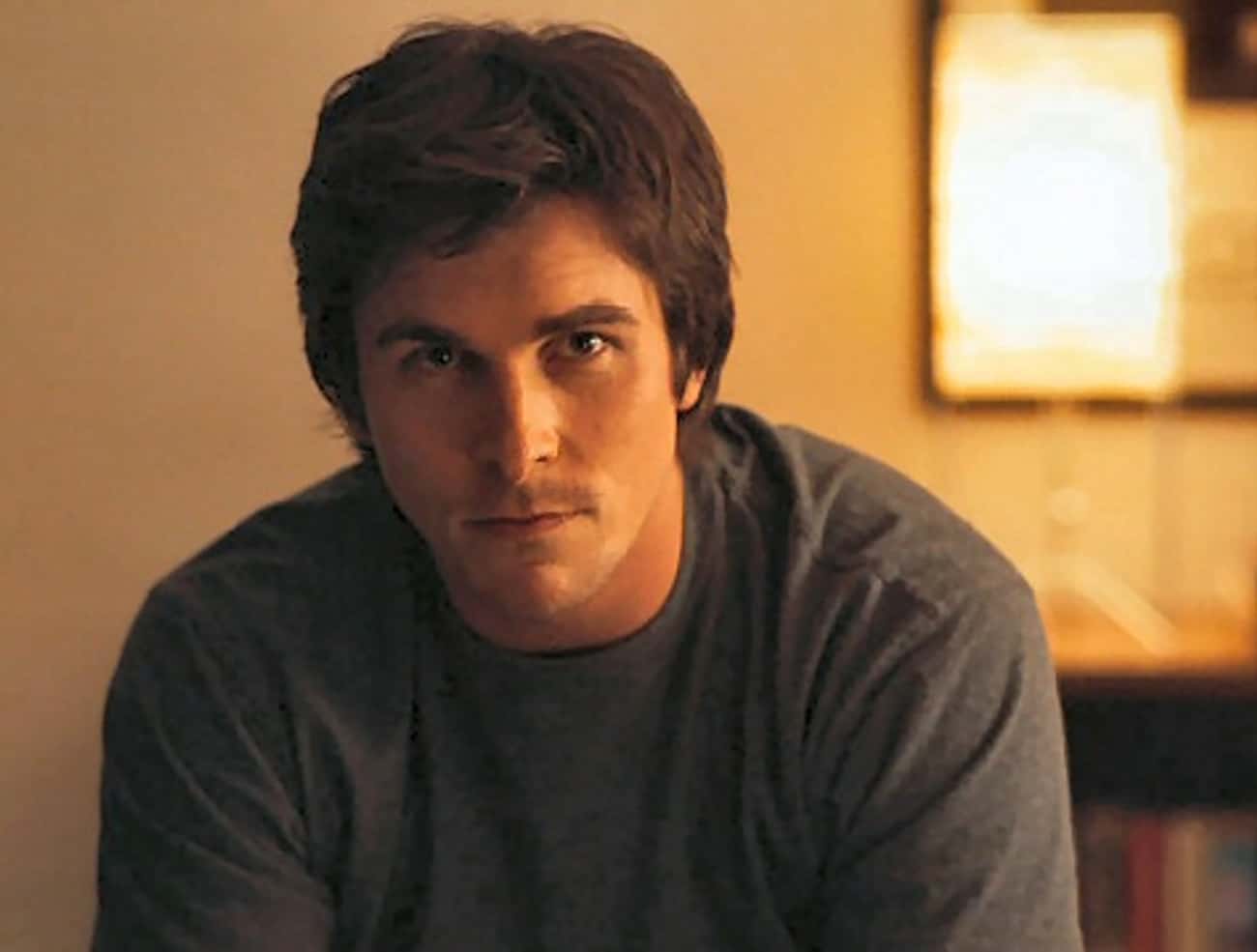 Young Christian Bale in Gray Shirt