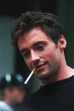 young-hugh-jackman-in-black-t-shirt-smoking-cigarette-photo-u1?auto=format&q=60&fit=crop&fm=pjpg&dpr=2&w=500
