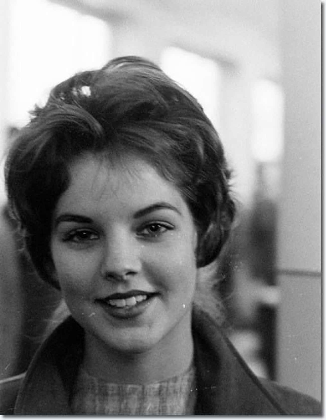 Young Priscilla Presley in a Turtleneck and Coat