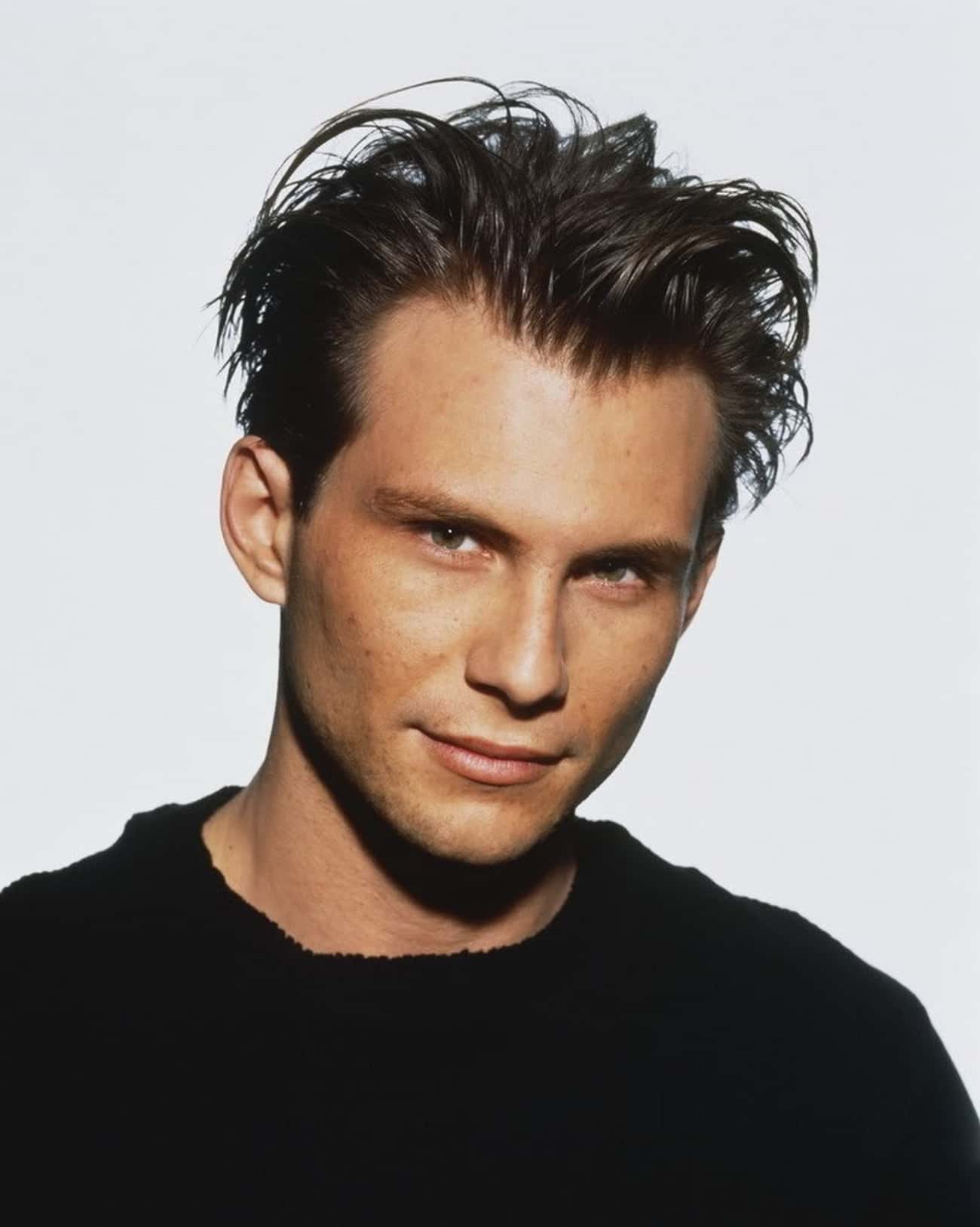 Young Christian Slater in Black Sweater