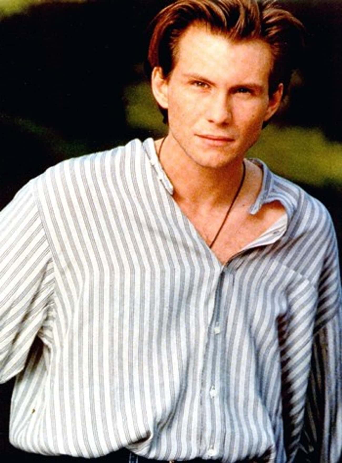 Young Christian Slater in Blue and White Striped Buttondown