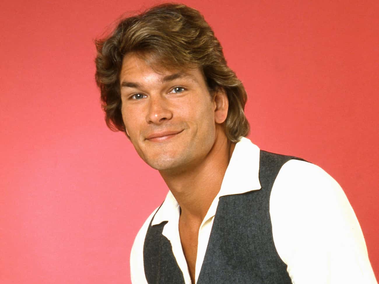 Young Patrick Swayze in White Buttondown with Gray Vest