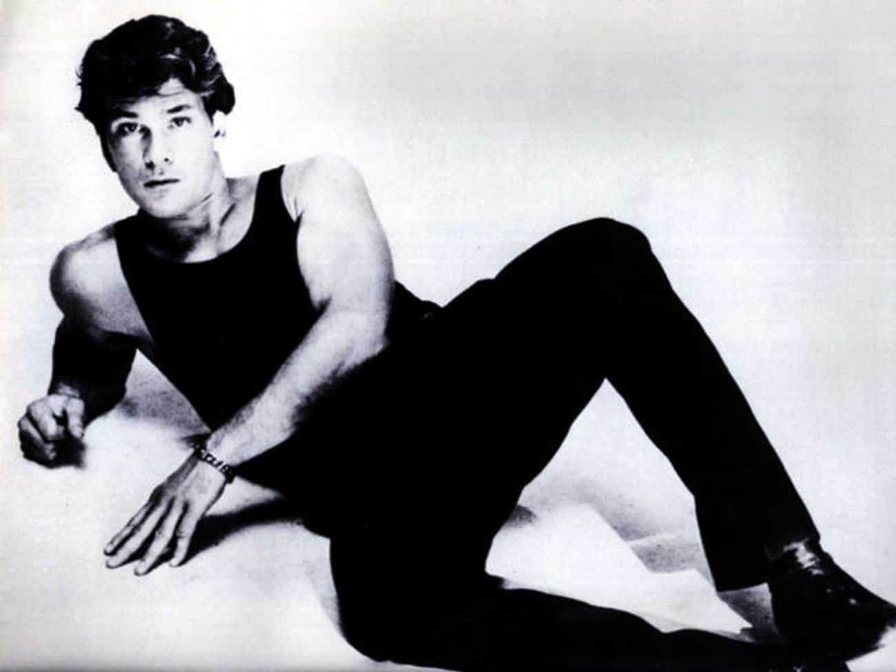 Young Patrick Swayze in Black Tank Top and Black Pants