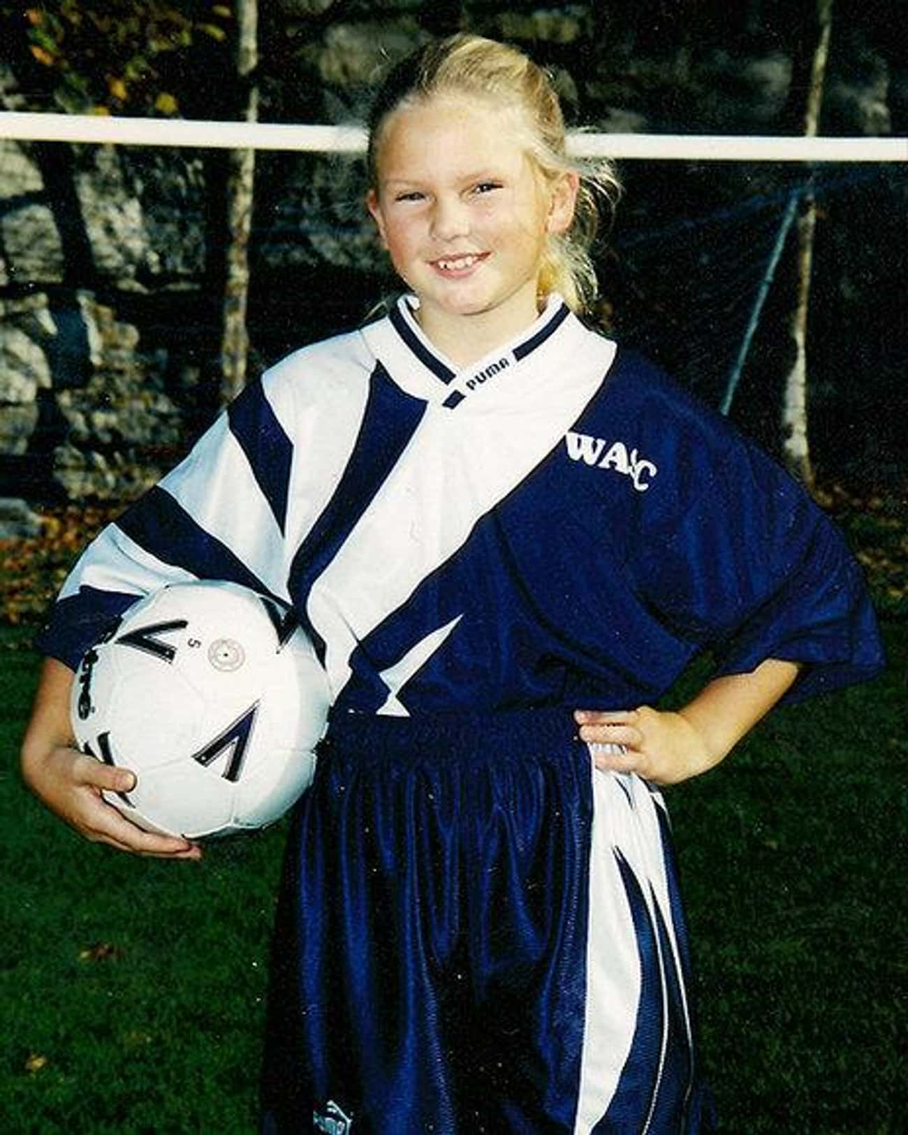 Young Taylor Swift in a Sports Uniform