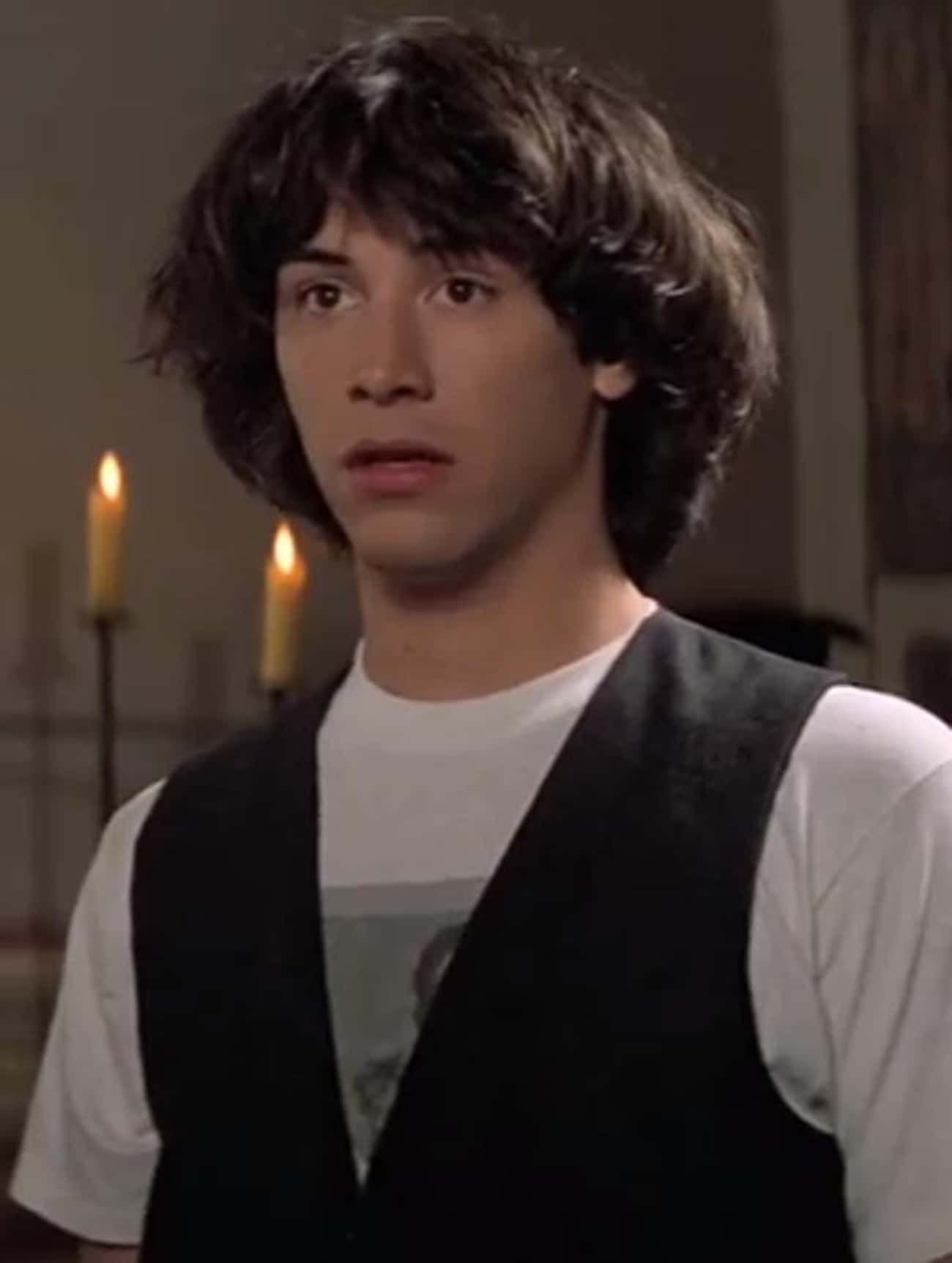 Young Keanu in White T-Shirt and Black Vest