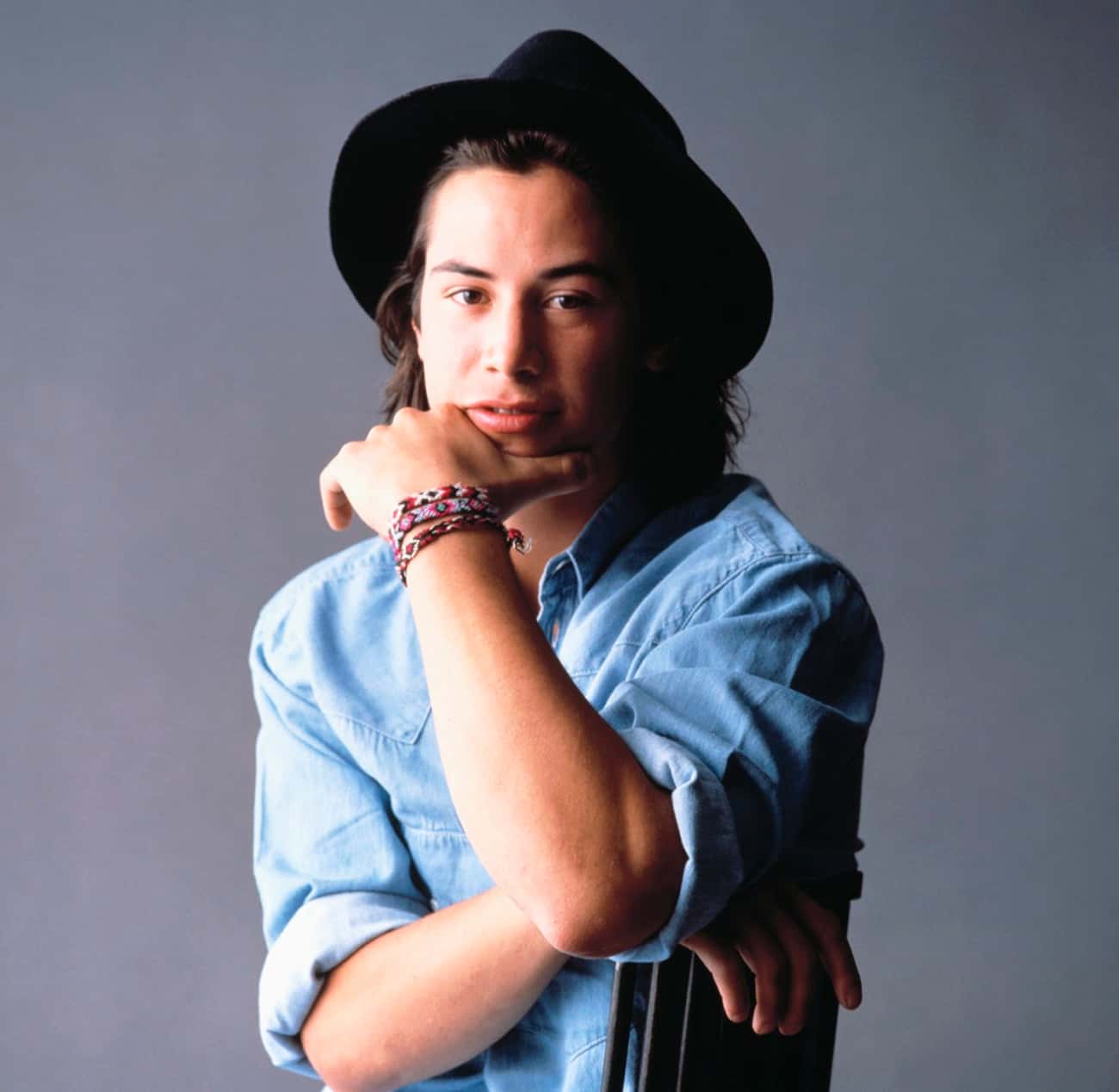 Young Keanu in Blue Buttondown and Black Hat