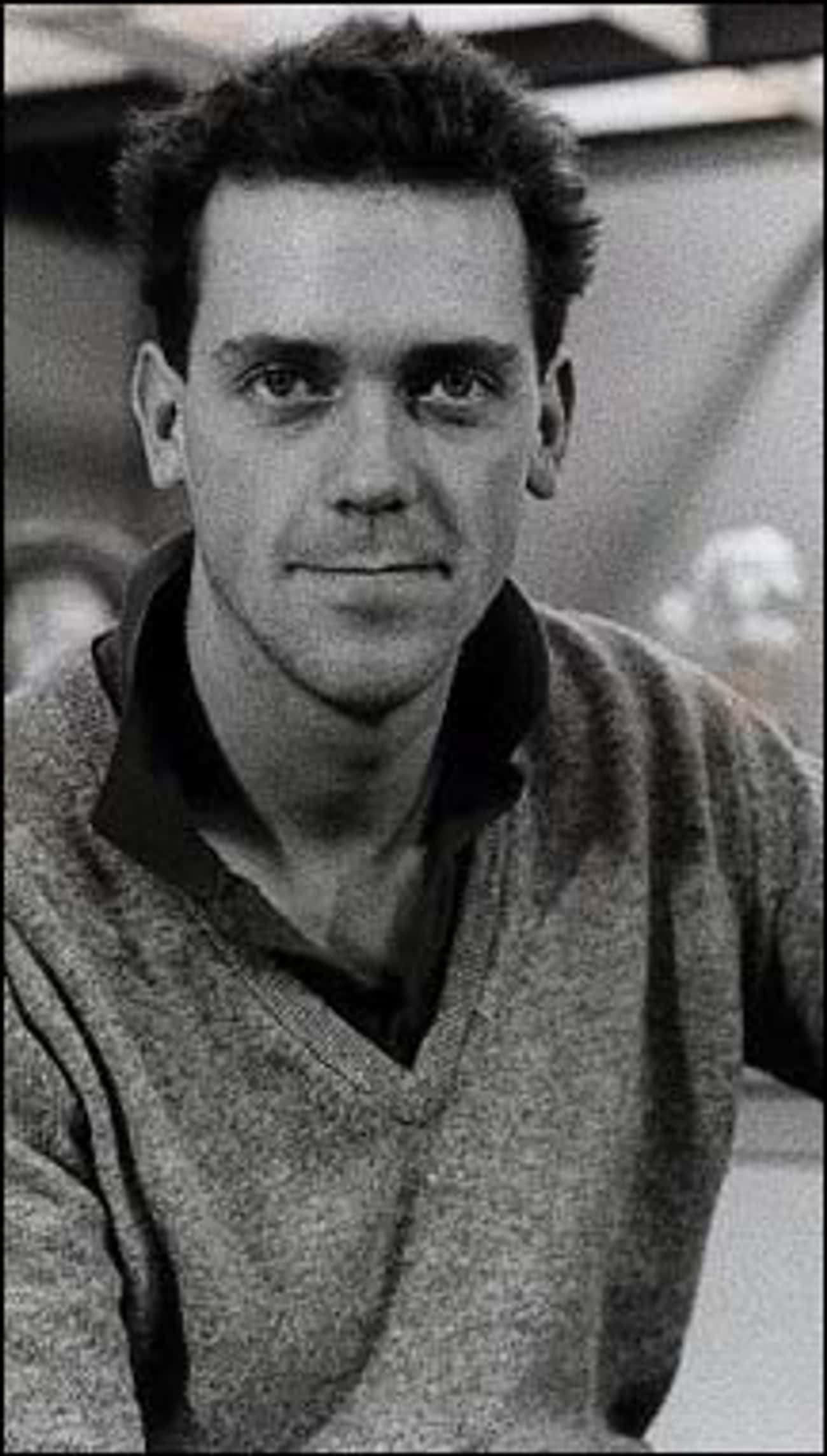 Young Hugh Laurie in Black Buttondown and Gray Sweater