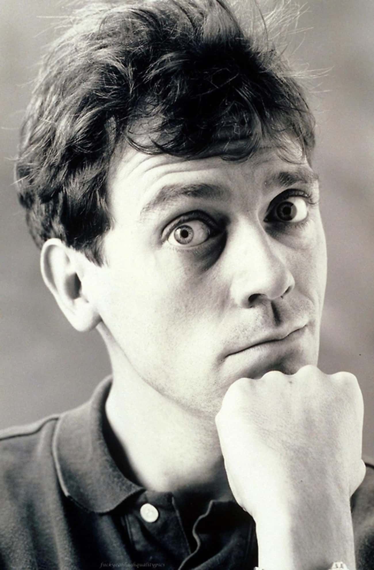 Young Hugh Laurie in Black Polo Shirt