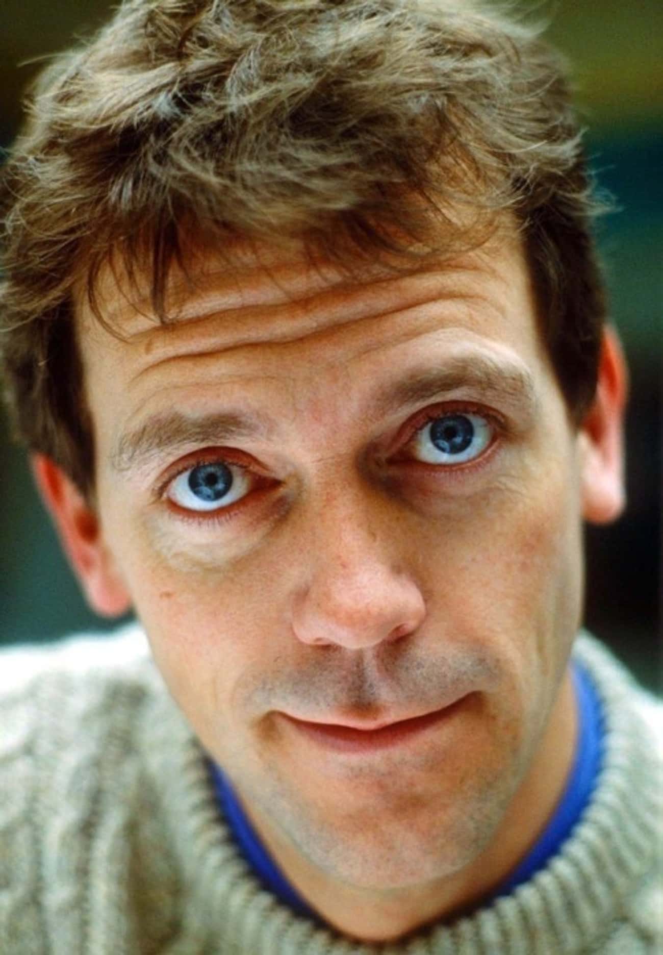Young Hugh Laurie in White Sweater