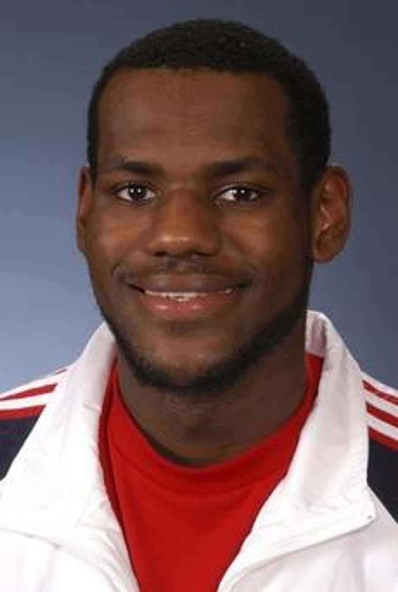 Young LeBron James in White Striped Jacket and Red T-Shirt