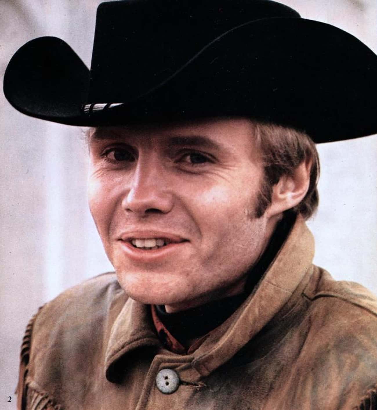 Young Jon Voight in Brown Leather Jacket and Black Cowboy Hat