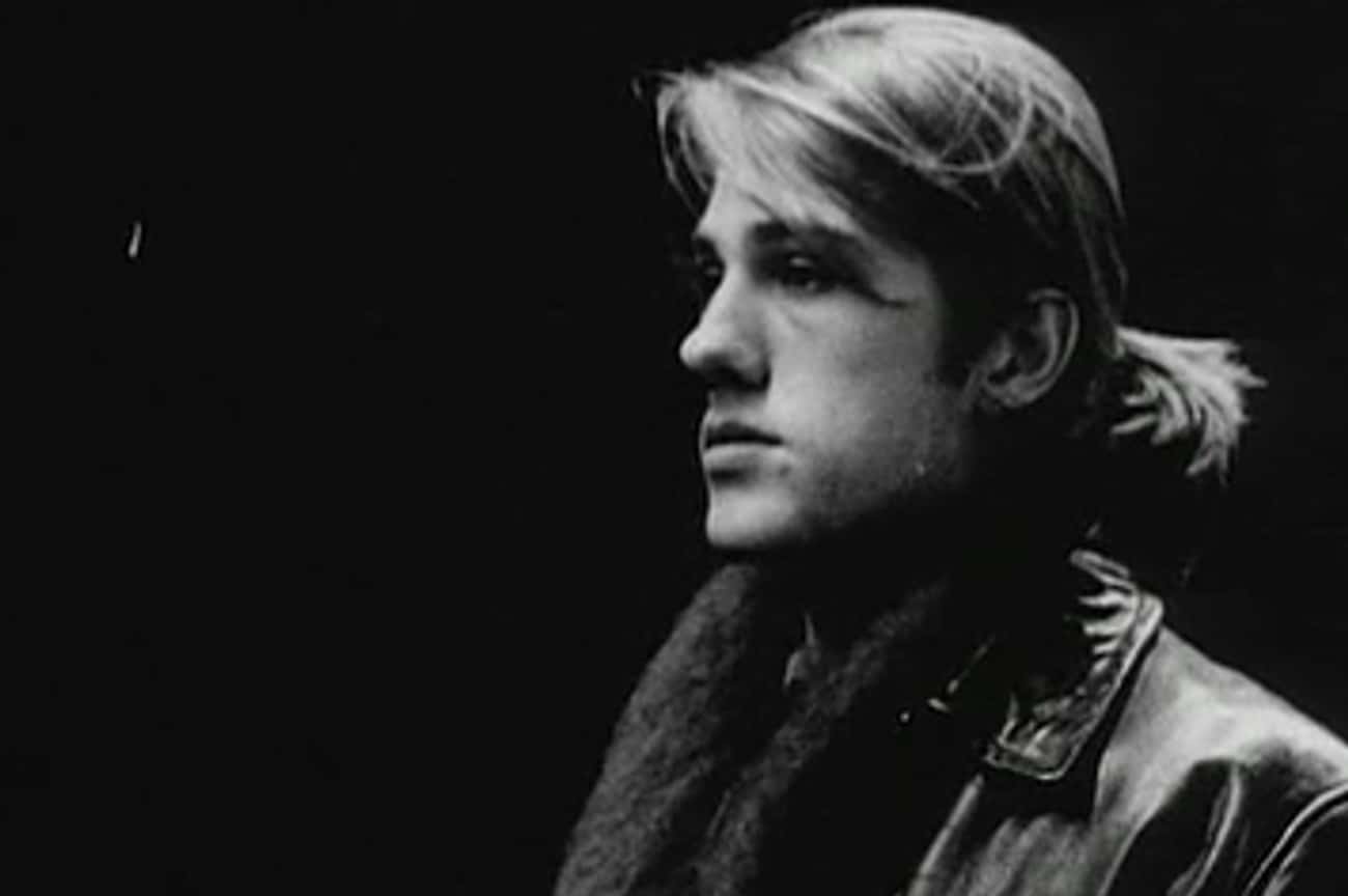 Young Christoph Waltz in Black Leather Jacket and Scarf