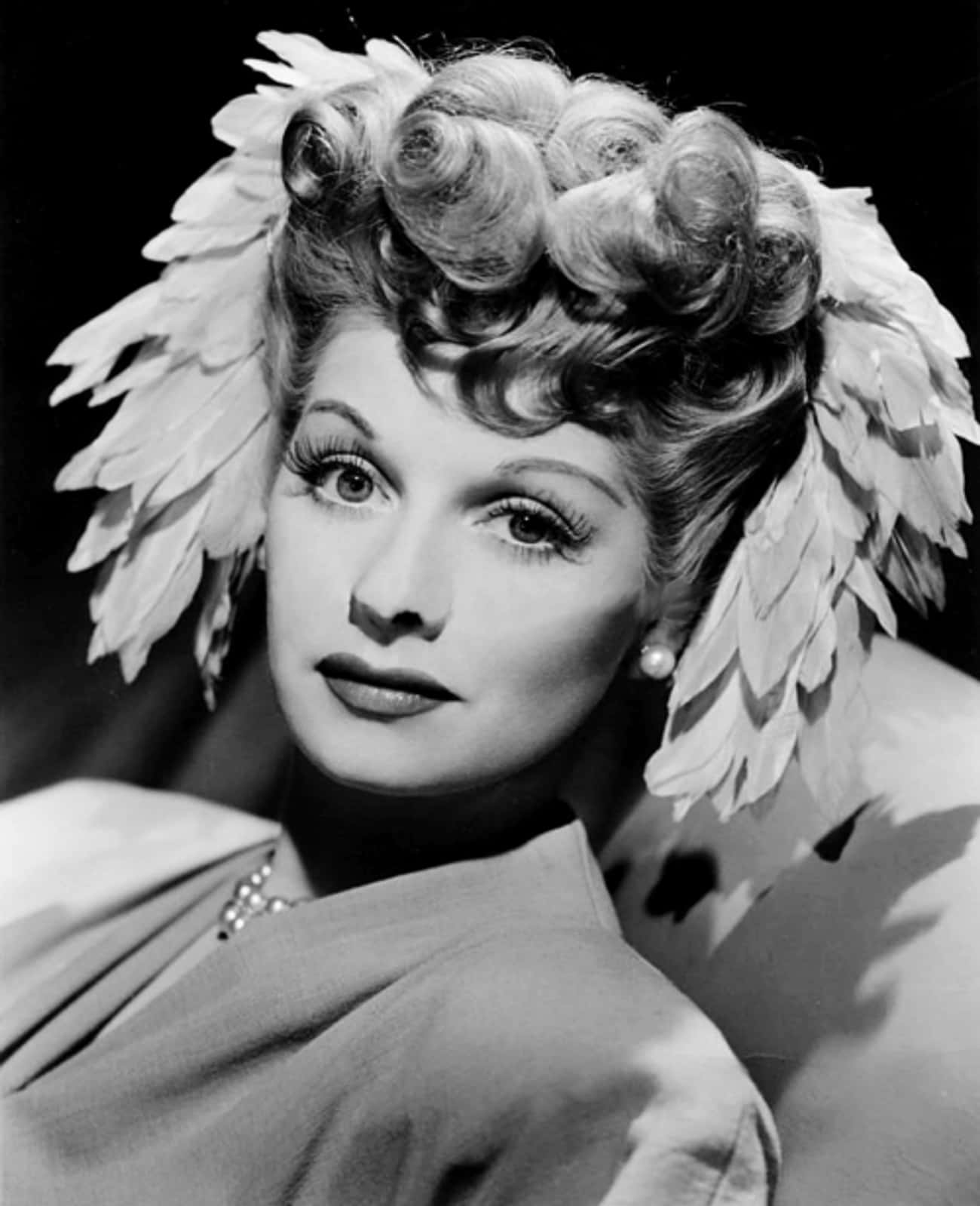 Young Lucille Ball with White Feathers in Hair