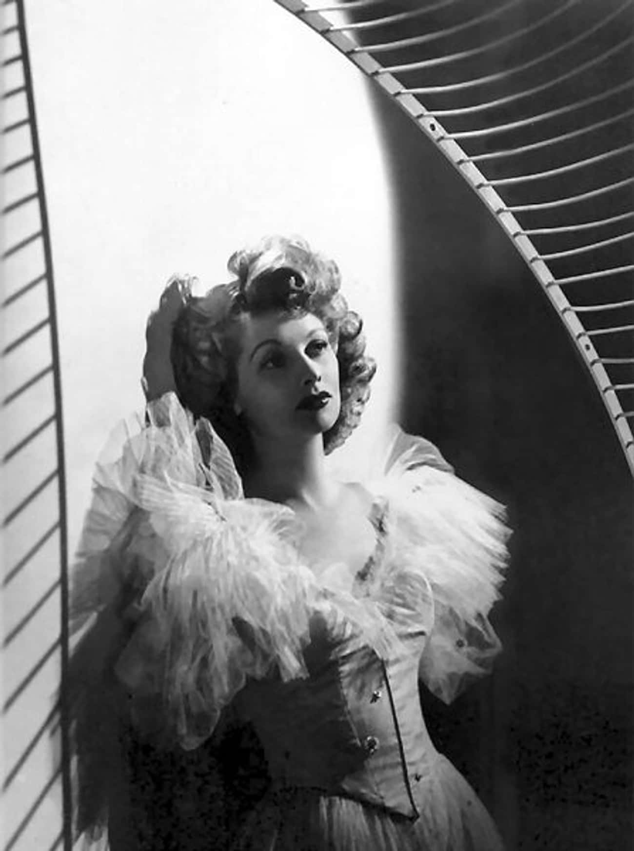 Young Lucille Ball in Elegant Dress with White Lace Collar