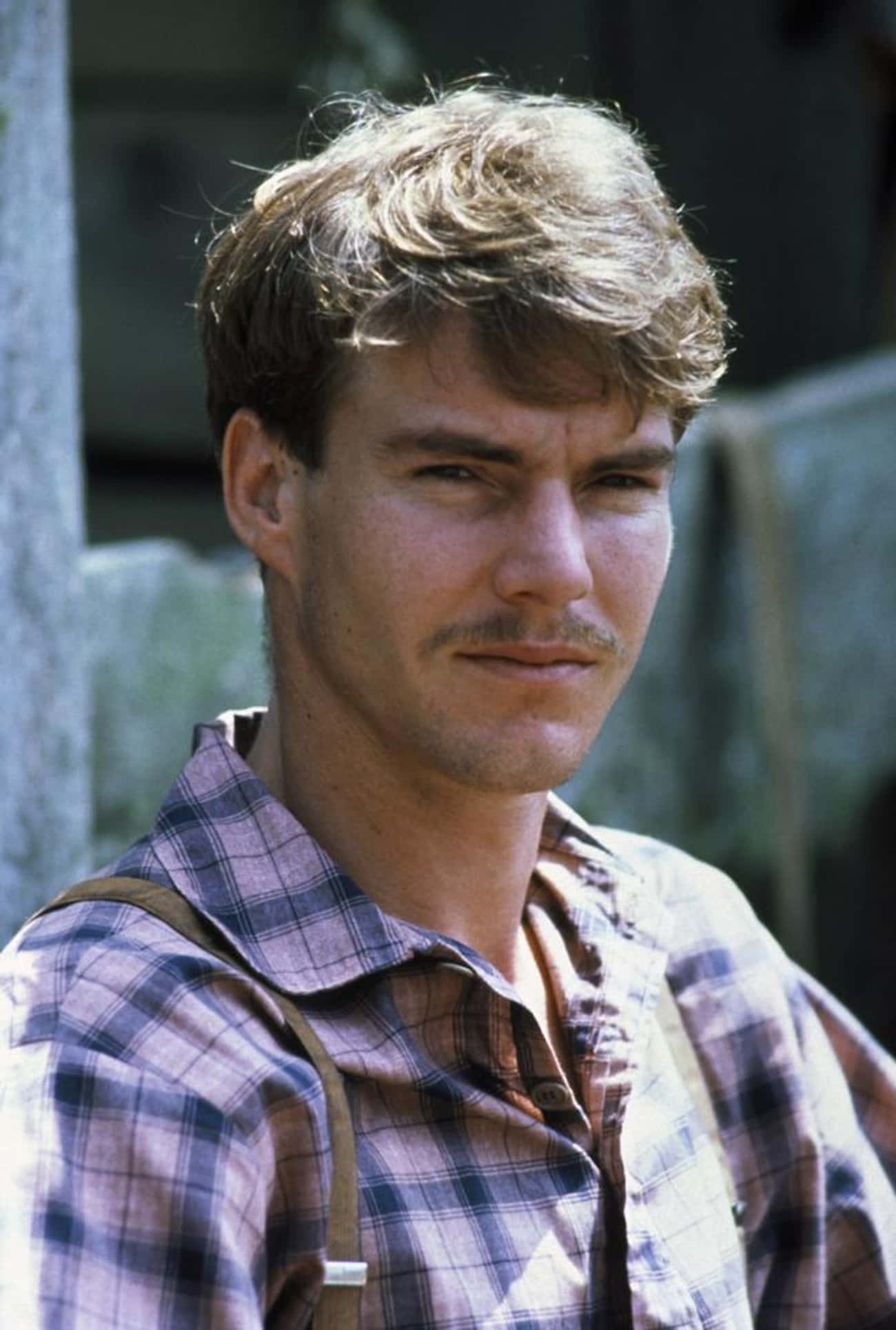 Young Dennis Quaid in Plaid Shirt and Suspenders