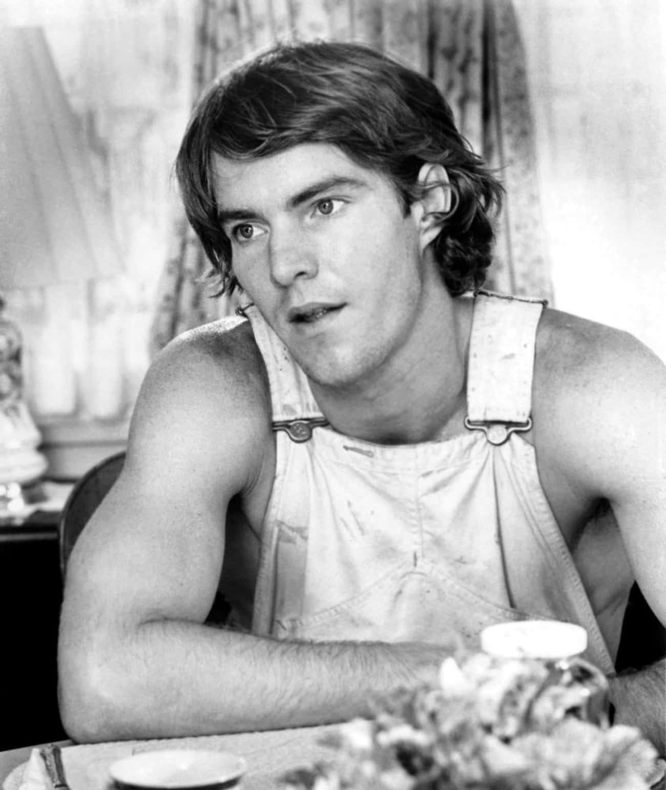 Young Dennis Quaid in White Overalls