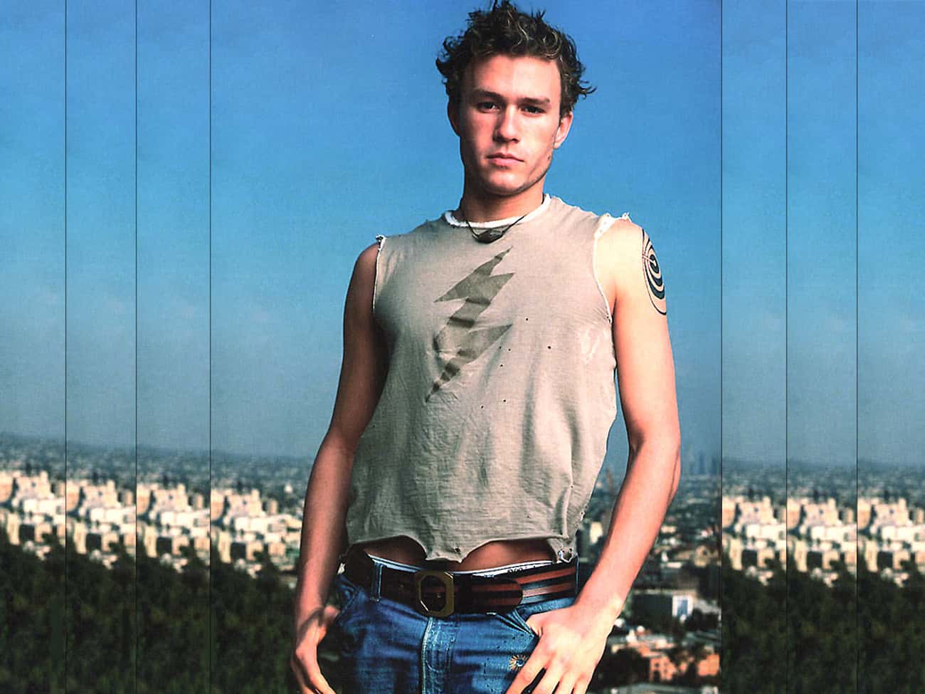 Young Heath Ledger in Light Gray Tank Top and Blue Jeans