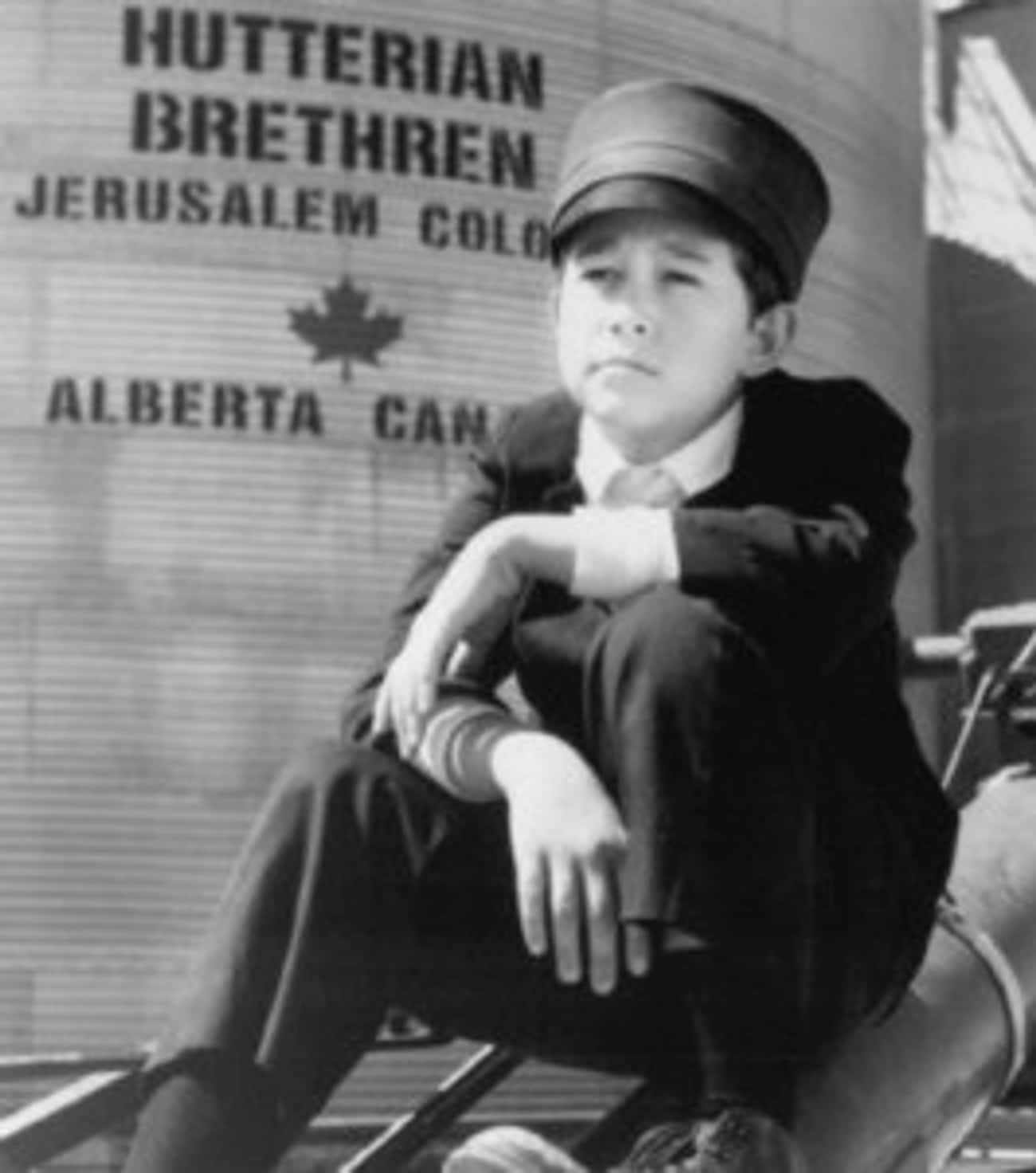 Young Joseph Gordon-Levitt Sitting on Car