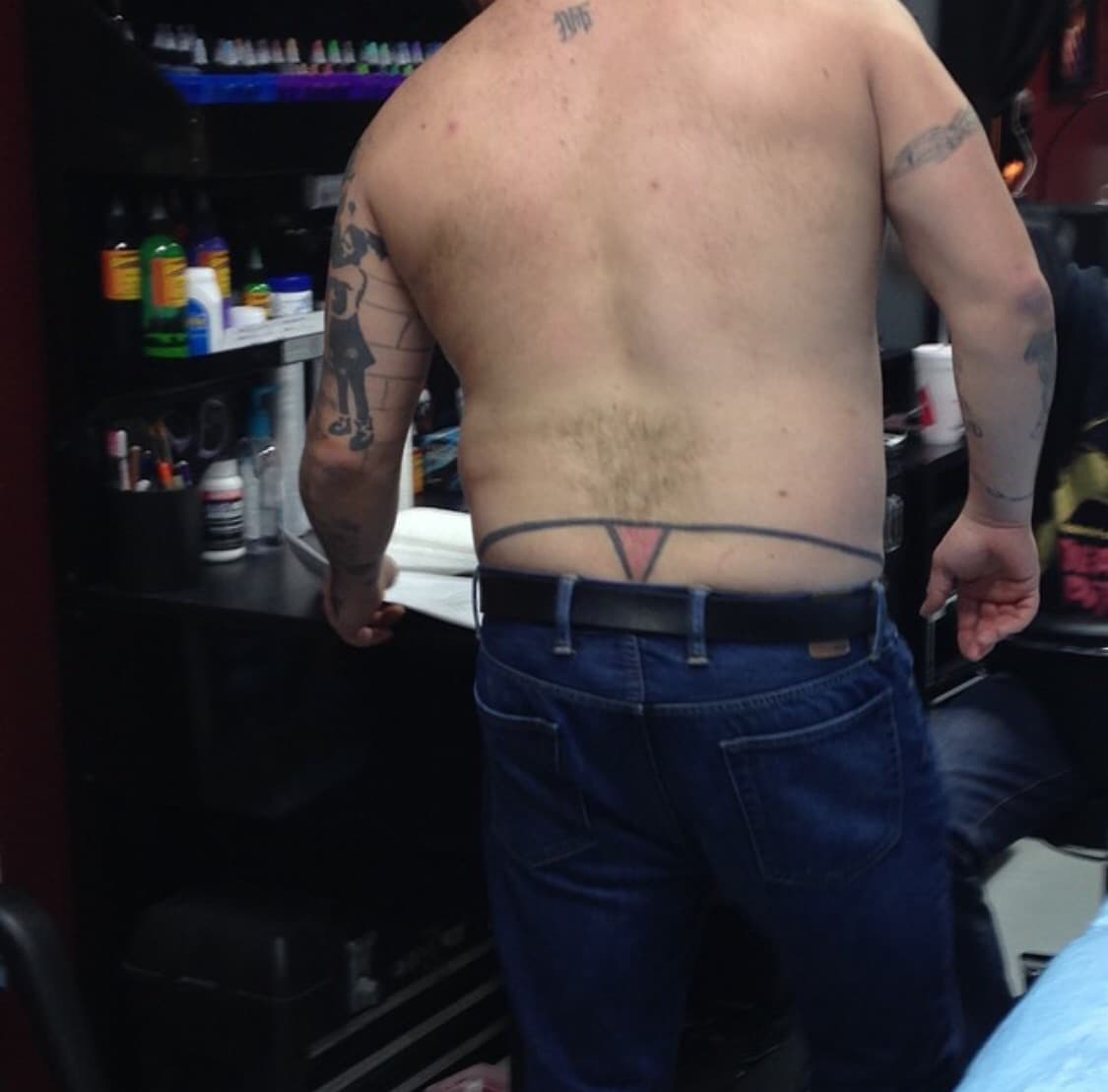 Lower Back Tattoos on Men
