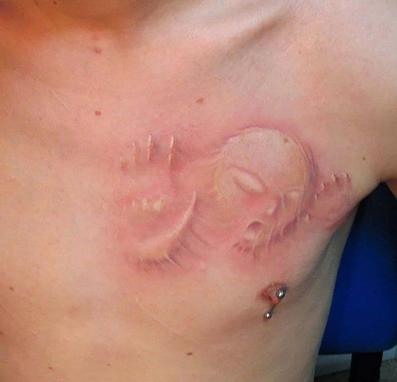 This Creepy White-Ink Tattoo Is Extra Terrifying