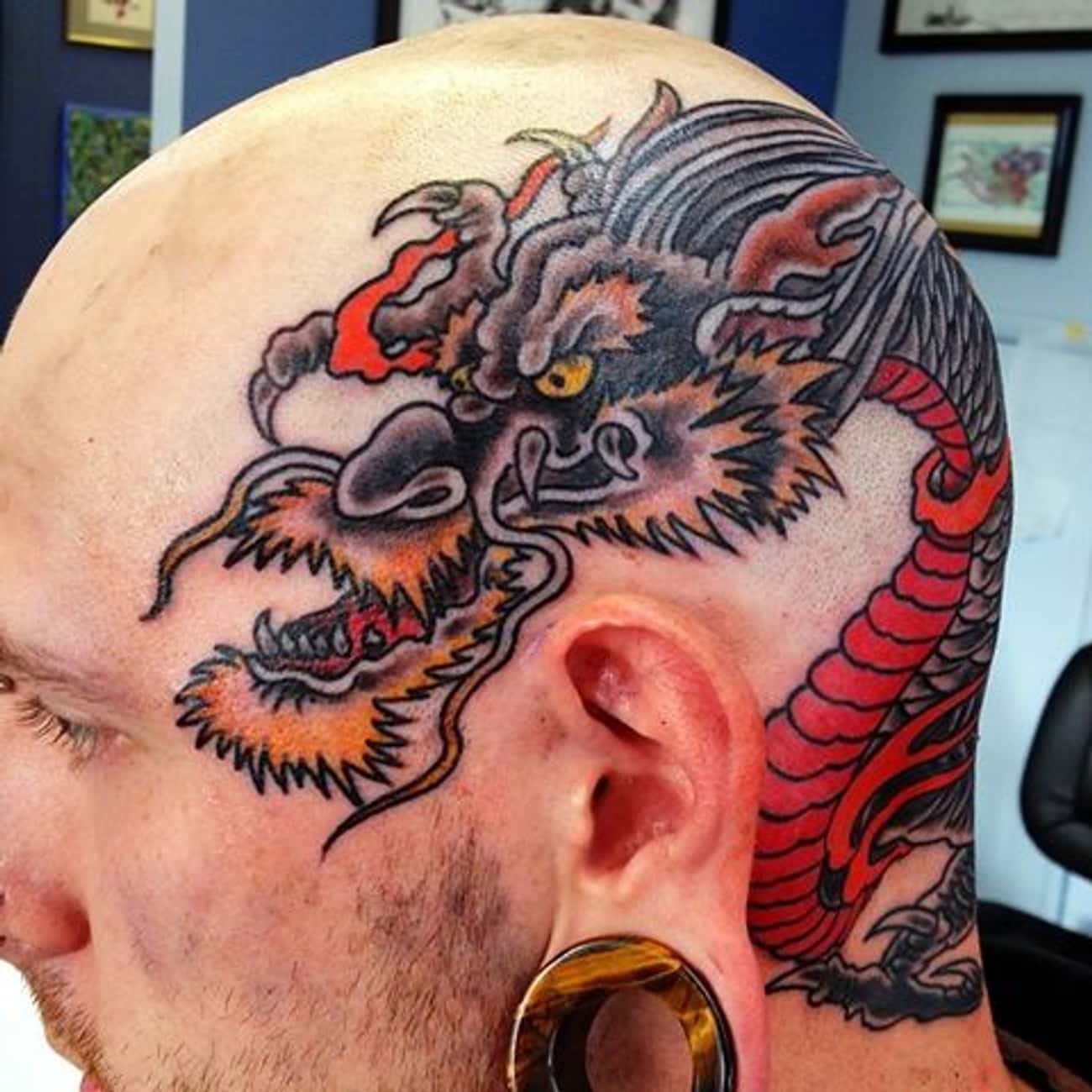 Татуировки драконов на голове