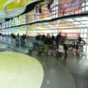 People Walking as Fast as They Can on the Moving Sidewalk on Random Fun Airport Scavenger Hunt Ideas