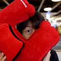 Blowing Up Neck Pillows on Random Fun Airport Scavenger Hunt Ideas