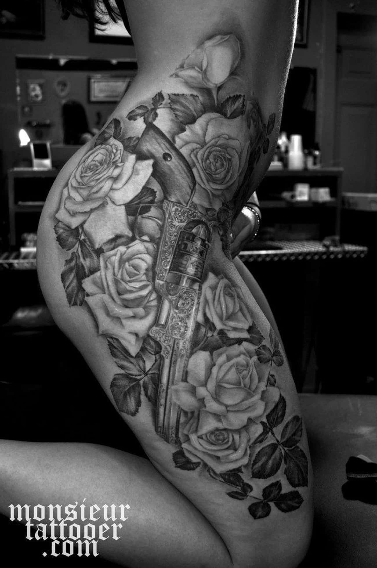 Gun And Roses Thigh Tattoo