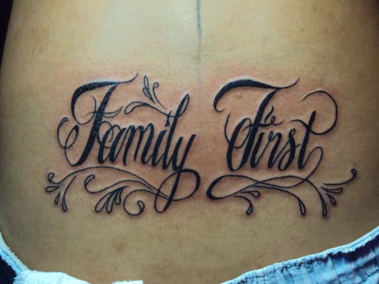 family first tattoo on chest with roses