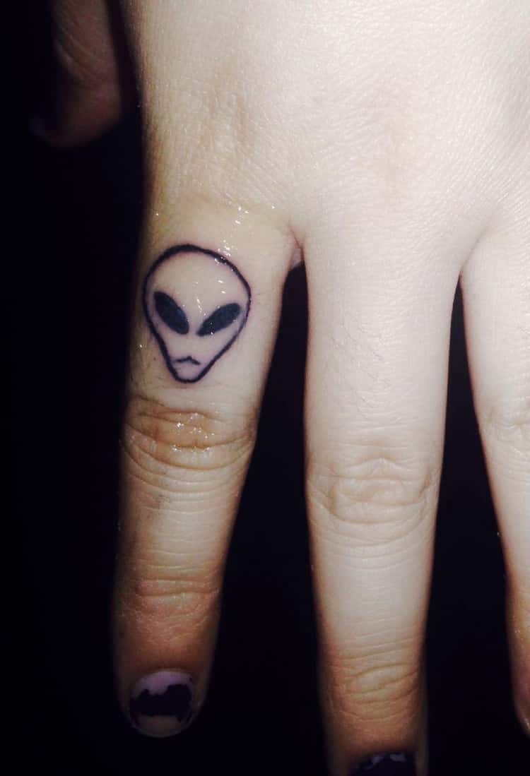 cute alien finger tattoo